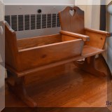 F57. Child sized rocker with cradle. 